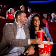 couple at the cinema eating popcorn